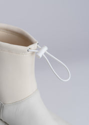 PHILIPPA - BUTTER RUBBERIZED NEOPRENE STRETCH ANKLE BOOT