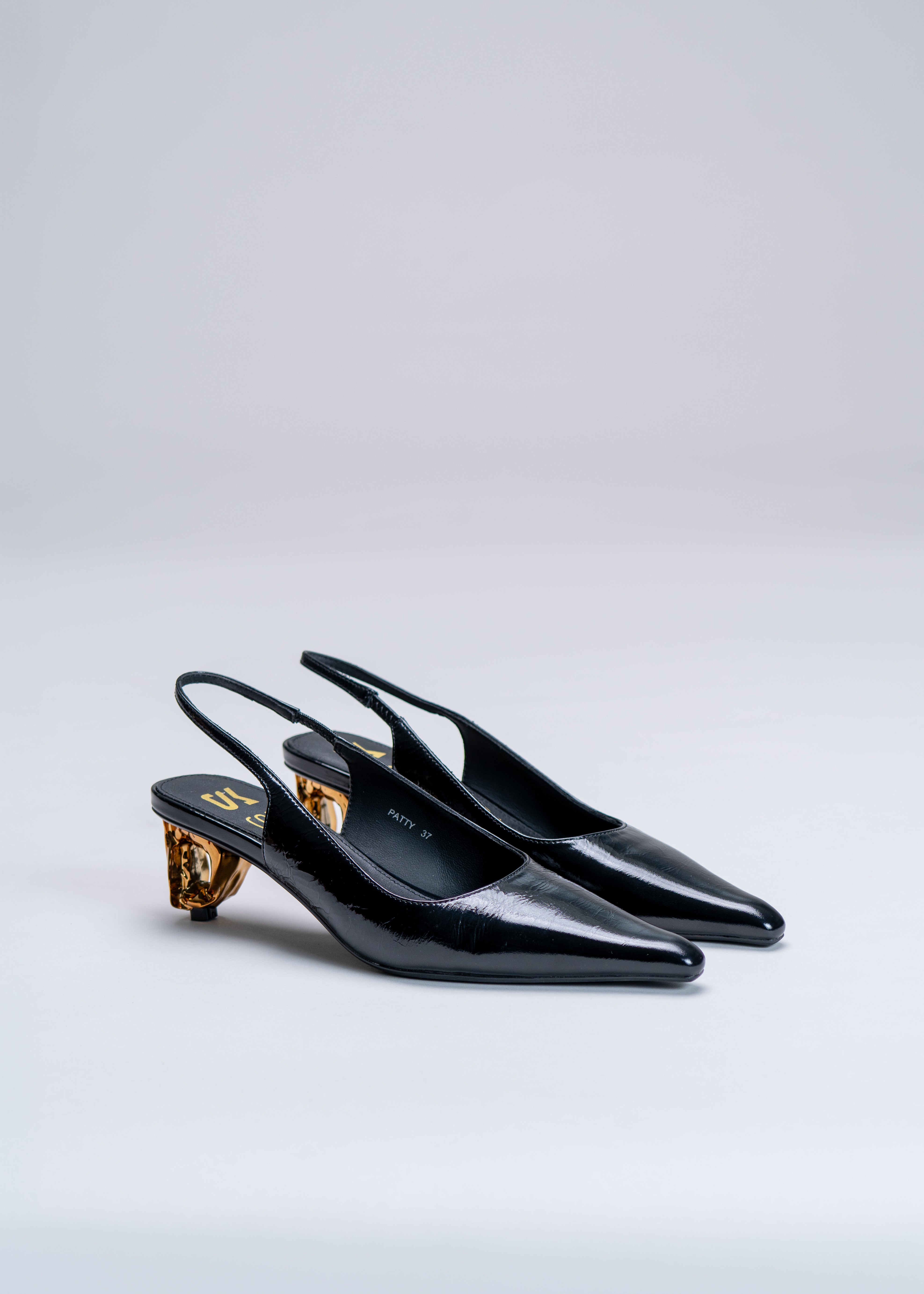 PATTY - BLACK PATENT CHANEL WITH SCULPTURAL HEEL