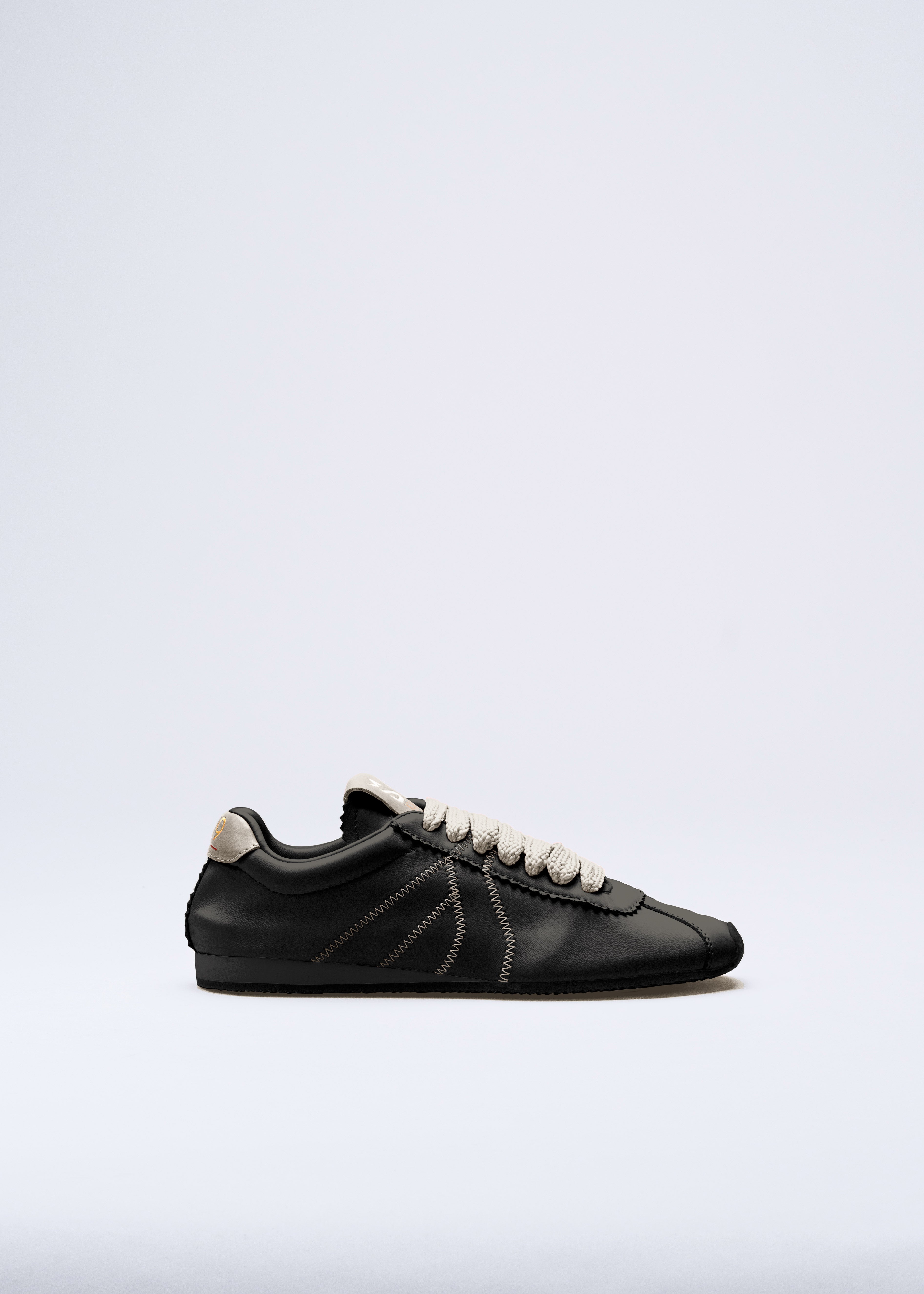 RIANNA - SNEAKER IN NAPPA NERA CON CONTRASTI