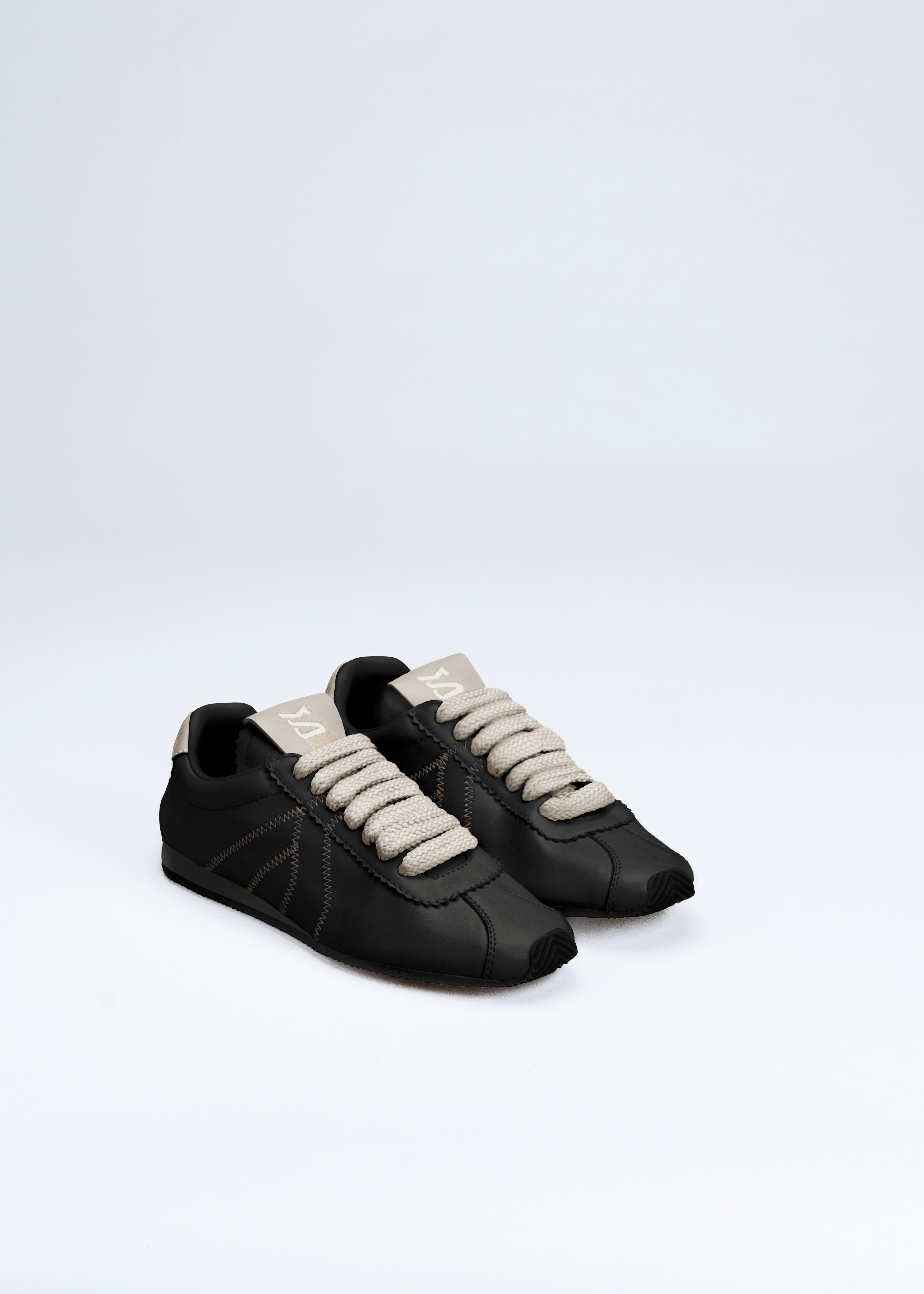 RIANNA - SNEAKER IN NAPPA NERA CON CONTRASTI