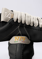 RIANNA - SNEAKER IN NAPPA NERA CON CONTRASTI